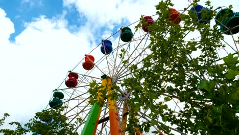 colorful ferris wheel in an amusement park.