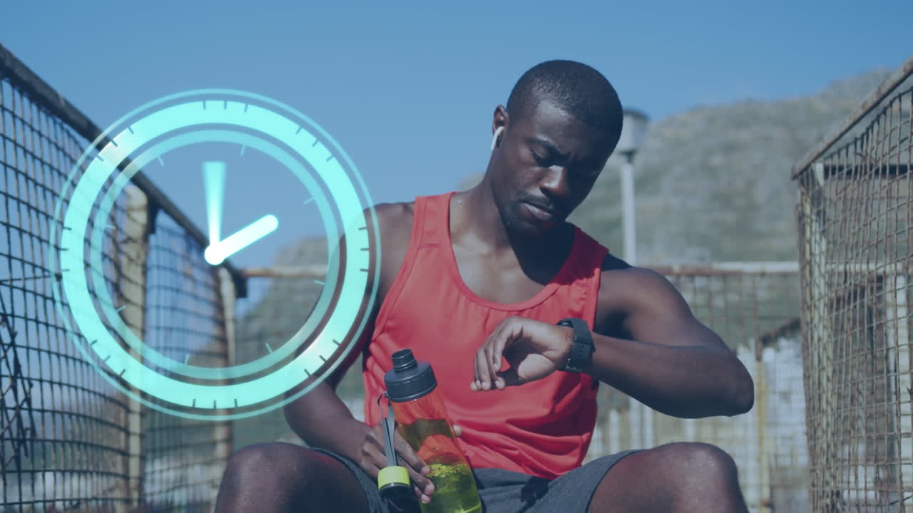 Animation of clock over african american man training in sun drinking water