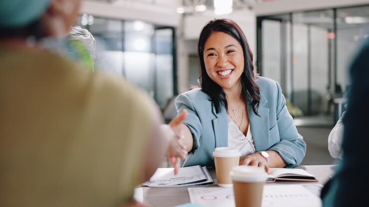 Deal, handshake and applause with business people