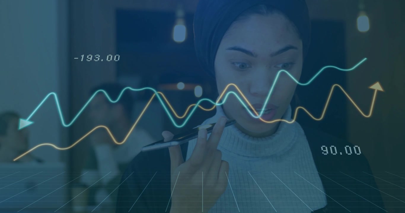 Woman holding smartphone beneath chin tapping pencil and initiating finance graphs updating values