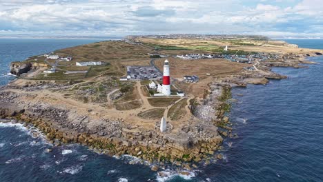 the famous portland bill lighthouse and rocky coastline of the isle of portland, uk