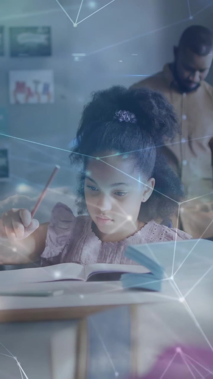 Vertical video: Student following peer pointing tracing book and writing to learn in class overlay