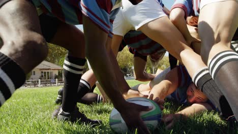 rugby players tackling during game 4k