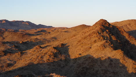 Sunny-Rough-Hills-As-Red-Cloud-Mine,-Arizona,-USA,-Aerial-Descending