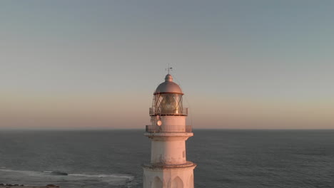 aerial view of cape trafalgar lighthouse at sunset