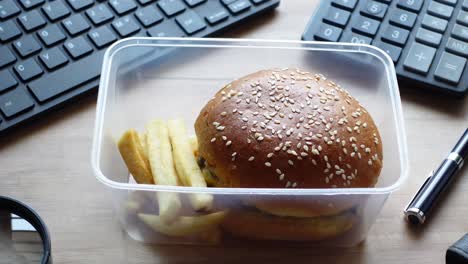 office lunch with burger and fries