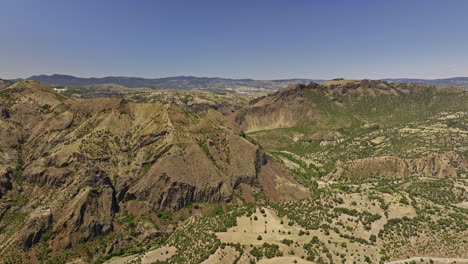 Ankara-Province-Turkey-Aerial-v1-drone-flyover-hilly-terrain-capturing-dry-natural-landscape-of-kuşcuören,-yakakaya-and-camlıdere-dam-in-the-distant-background---Shot-with-Mavic-3-Cine---July-2022