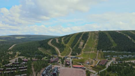 aerial view of ski resort during summer with lodging on foothills in salen, dalarna, sweden