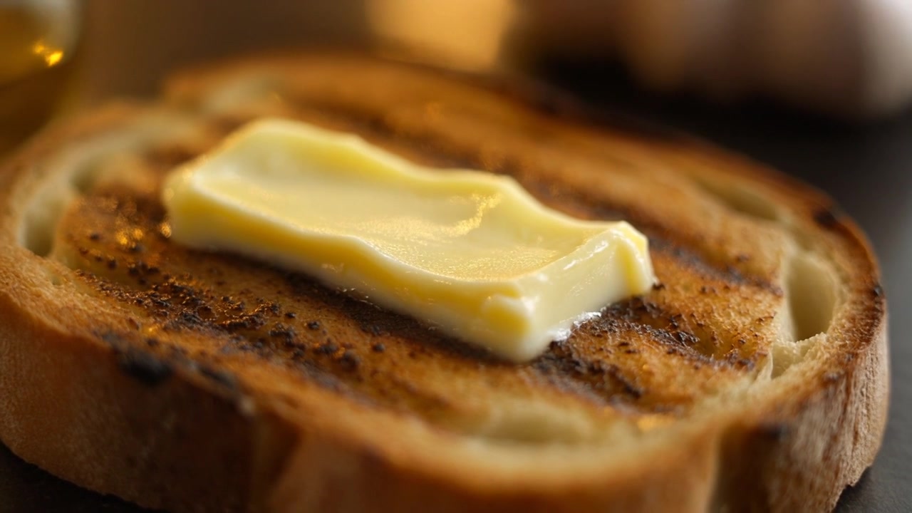 Slice of Toasted Bread with Melting Butter