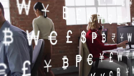 currency symbols animation over diverse professionals working in modern office