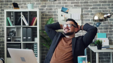 relaxed businessman in modern office