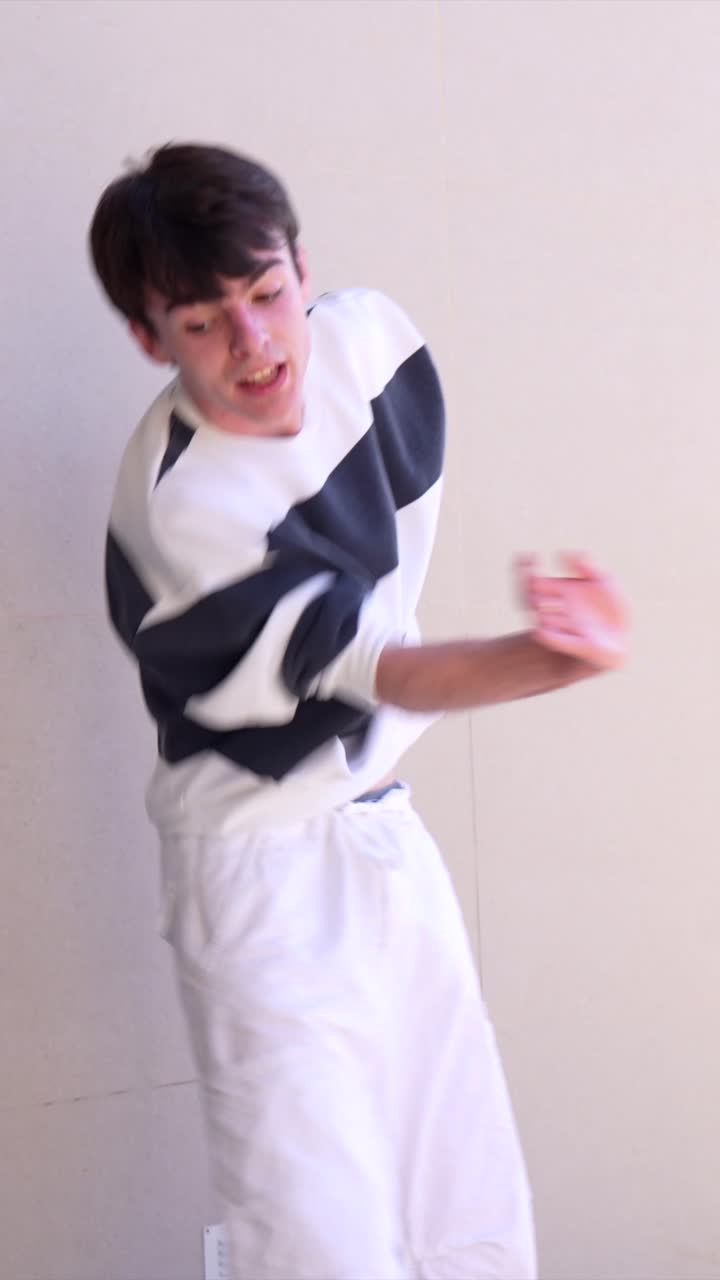 Images of a man in casual clothing