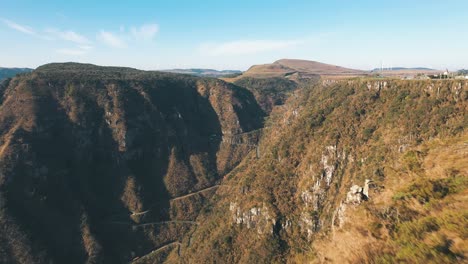 Cinematic-drone-establishing-shot-of-Serra-do-Rio-do-Rastro-road-and-the-mountains-of-Santa-Catarina