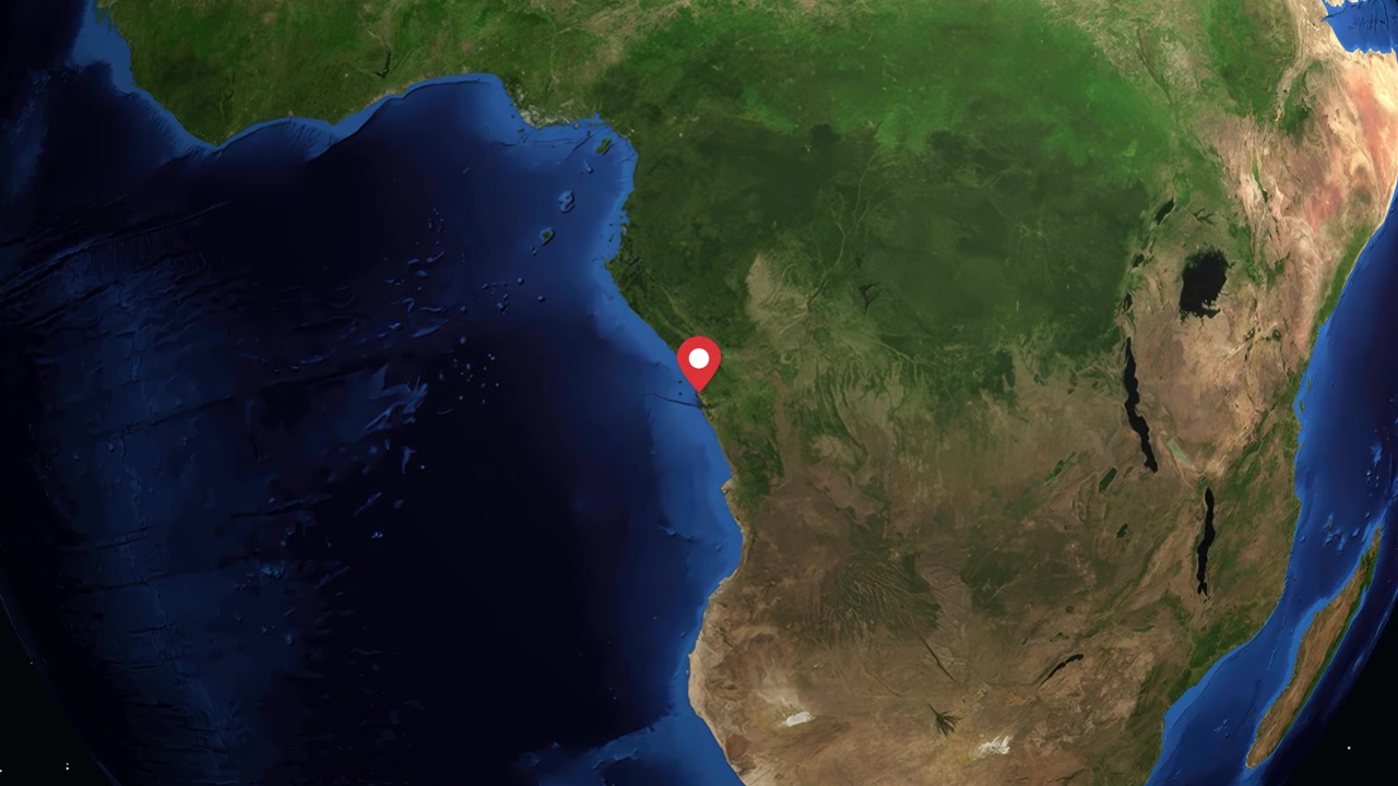 Digital globe rotates and zooms into Cabinda Angola with a red pin and data box