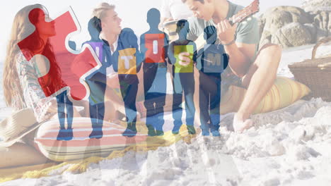 animation of colourful puzzle pieces and autism text over happy friends at summer beach party