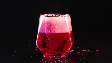 sparkling red drink in glass