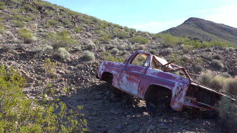 An-abandoned-pickup-truck-sits-rusting-in-the-Mojave-Desert-1