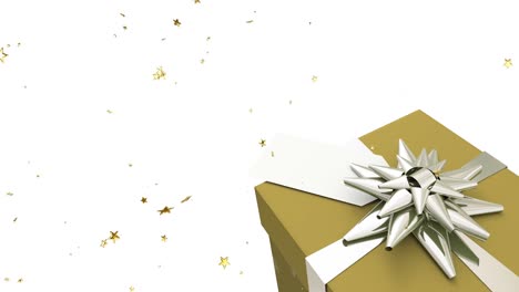 animación de estrellas doradas caídas con regalo de navidad dorado en fondo blanco.