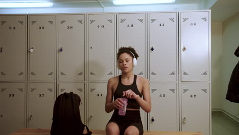 young woman in the locker room