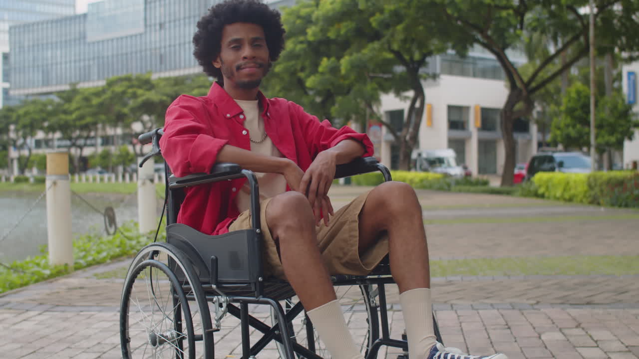 Black Man in Wheelchair Waiting Friends Outdoors