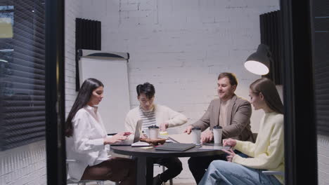 group of diverse colleagues having a business meeting in the boardroom 1