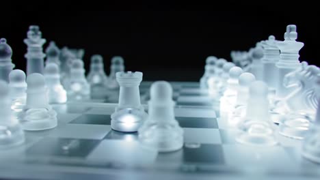 a captivating game of chess: expert moves and strategies revealed in a stunning high-contrast visual display of transparent pieces on a checkerboard