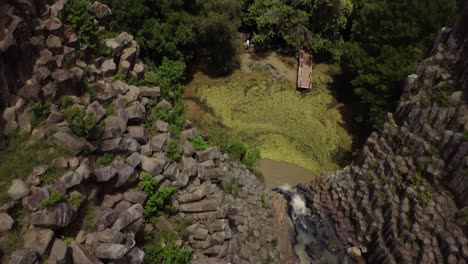 Aerial-drone-shot-of-prisms-rocks-dock