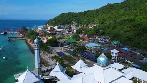 islamic white mosque at beach on perhentian island