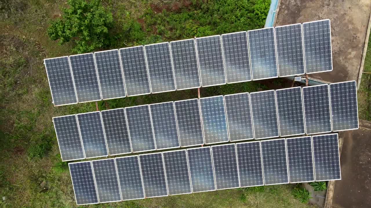 Solar power source supplying energy in the water source in suburban village of Africa