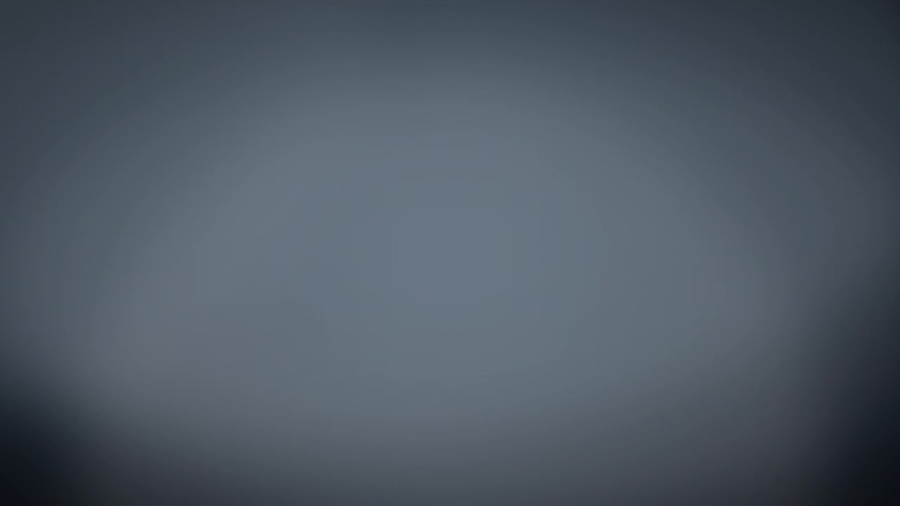 Abstrakt mörkgrå bakgrund med mjuk ljusgradient