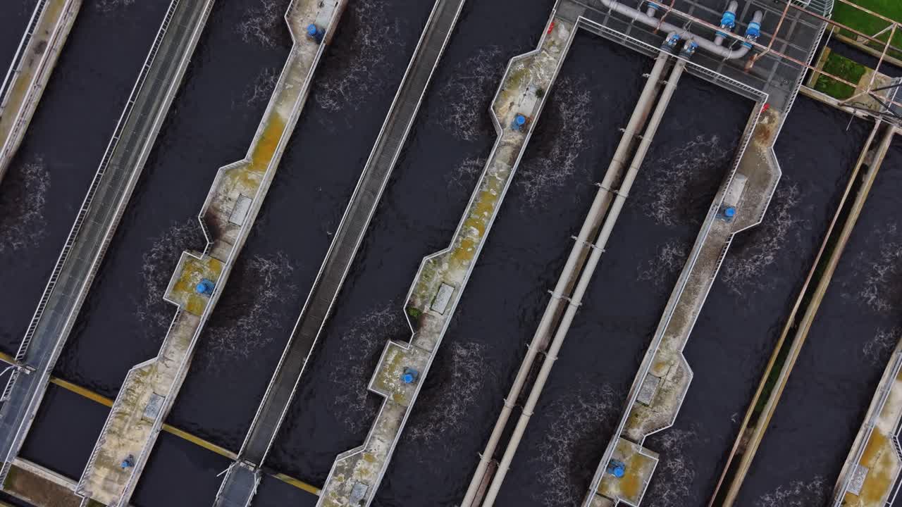 Water treatment facility with tanks and channels in urban area
