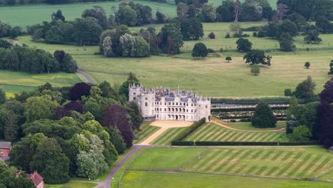 aerial shot of longford castle in wiltshire, historic mansion and countryside destination
