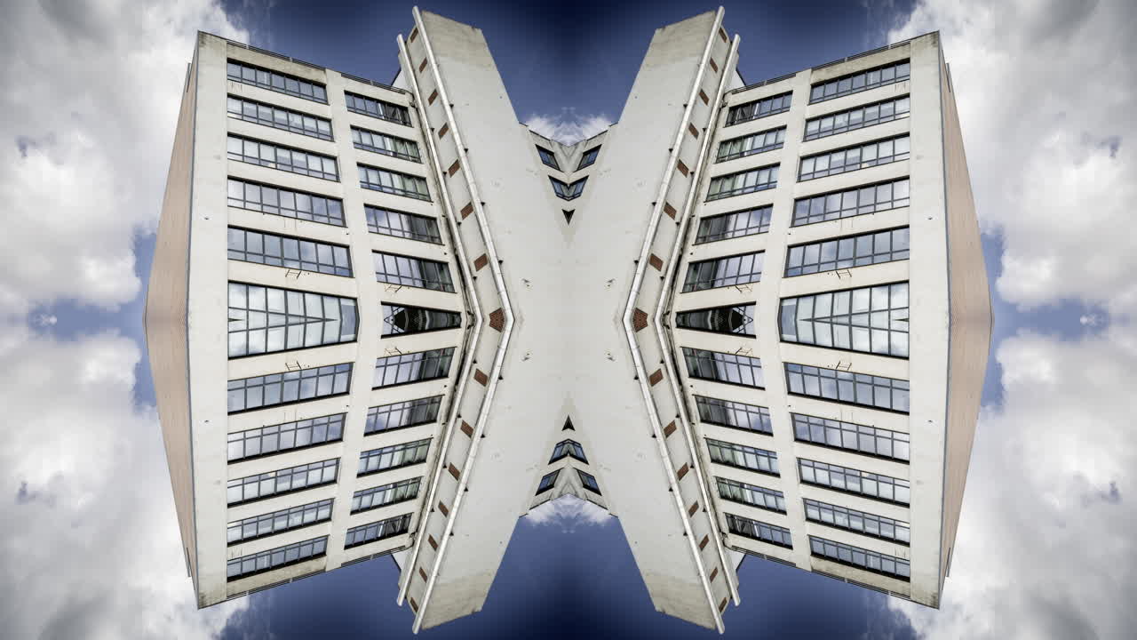 Old factory and industrial complex with passing clouds made into abstract pattern