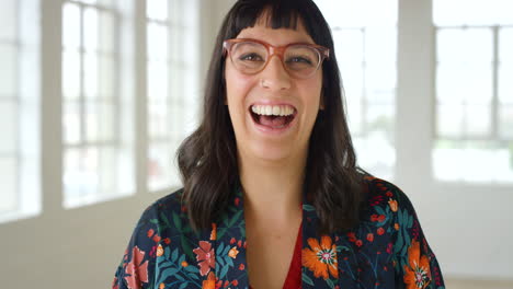 Portrait-of-a-beautiful-woman-showing-her-teeth