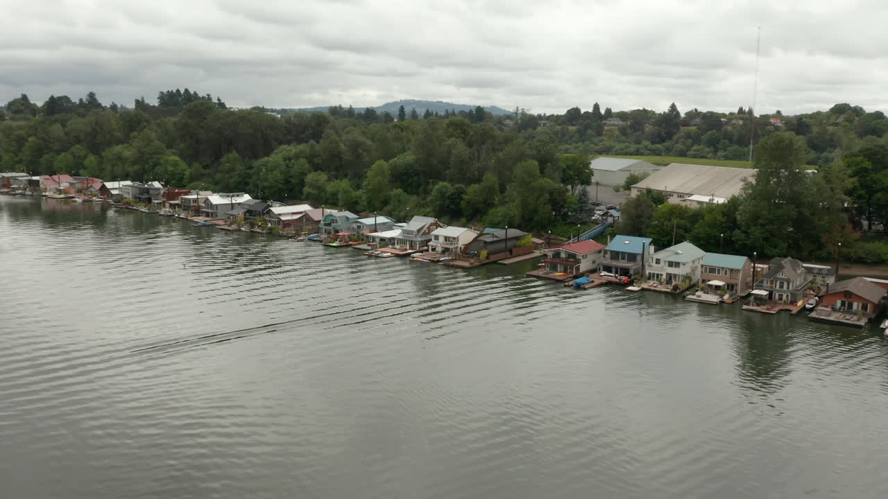 aerial orbit around house boats in souther portland willamette river.