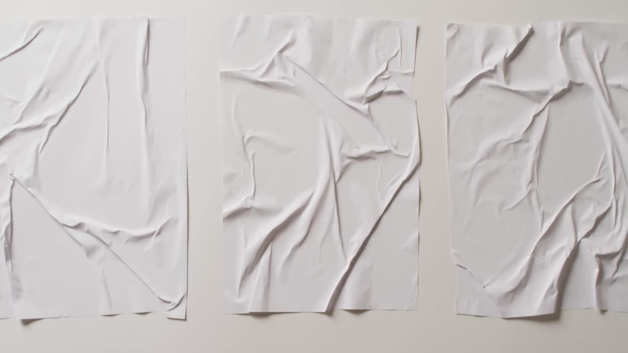 video de primer plano de tres piezas de tela arrugada blanca con espacio para copiar