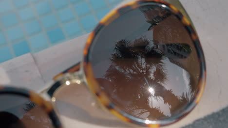 sunglasses with palm reflection summer holidays