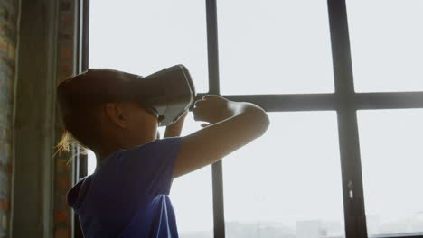 girl using virtual reality headset in office 4k