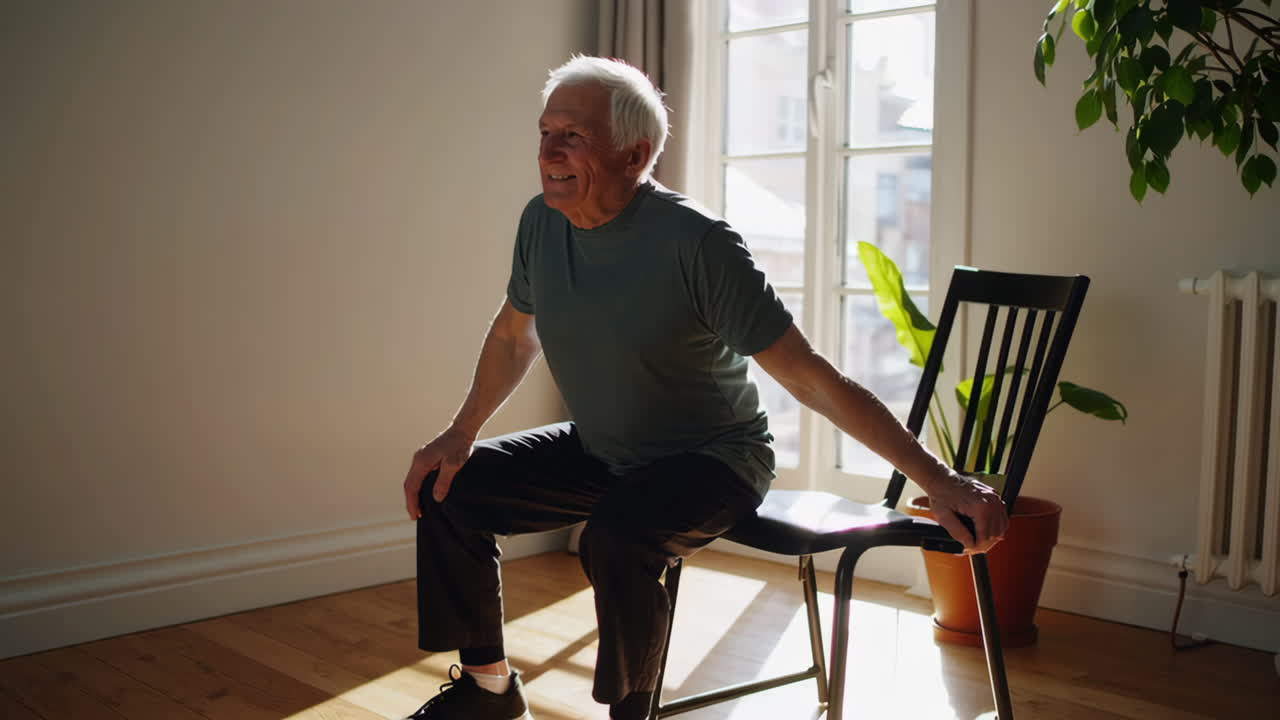 Senior Man Doing Chair Exercises at Home