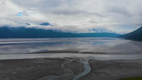 4K-Cinematic-Drone-Video-of-Mountains-Overlooking-Turnagain-Arm-Bay-at-Low-Tide-Near-Anchorage,-AK