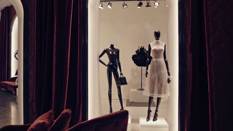 luxe dubai boutique interior showcasing glowing crystal welcome sign, expensive furniture, stylish mannequins against lavish background of high end retail space