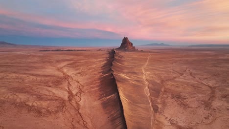 deserted landscape around ship rock, new mexico at sunset - drone shot