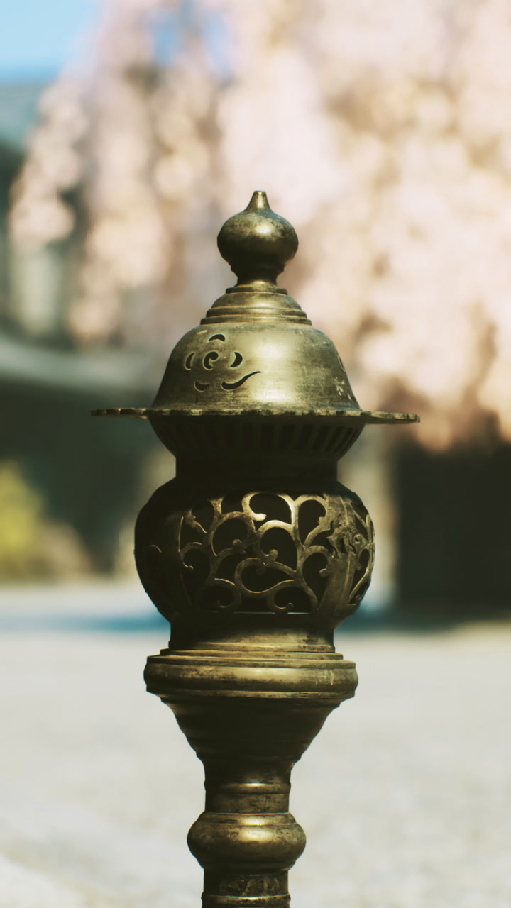 Ornate street post in a tranquil neighborhood with blooming trees