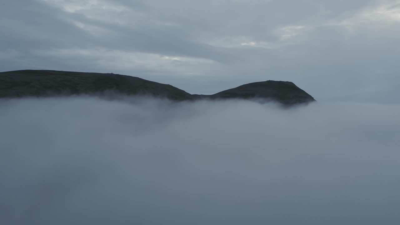 Mysterious Scandinavian Landscape, Mountains Emerging from the Clouds