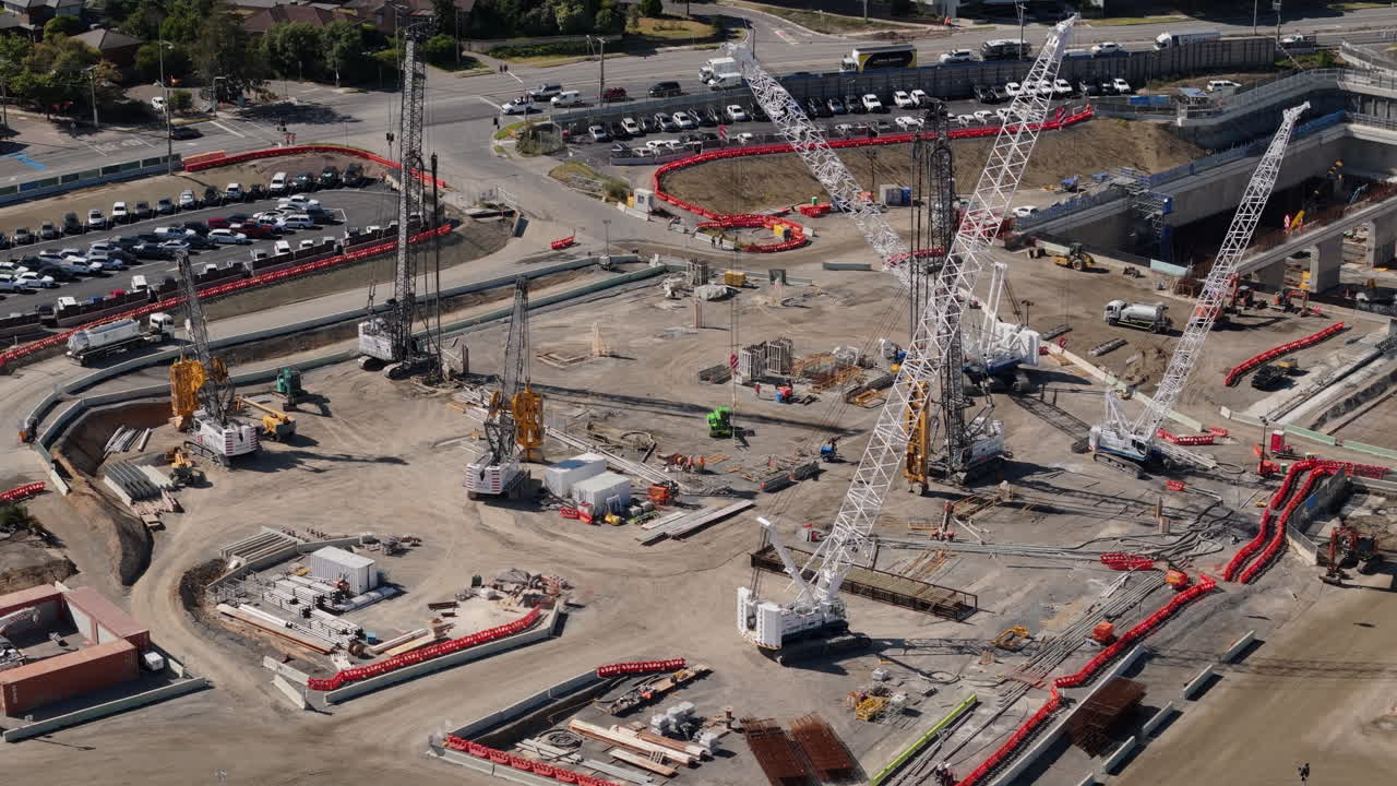 Aerial Time Lapse of Large Urban Construction Site with Cranes