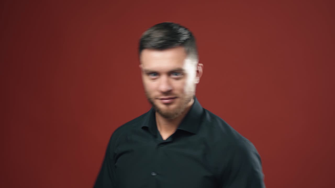 Side view of businessman. Studio shot of young attractive businessman