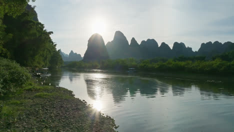 aerial view over mirroring water of lijiang river, renminbi 20 yuan scene in china