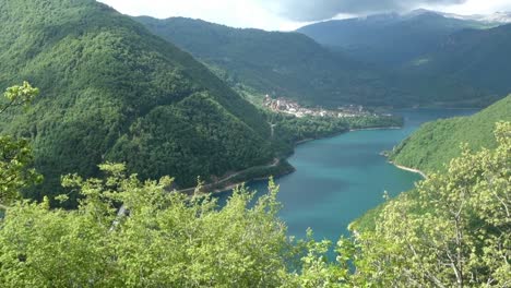 piva lake and the city of pluzine on background. montenegro, europe