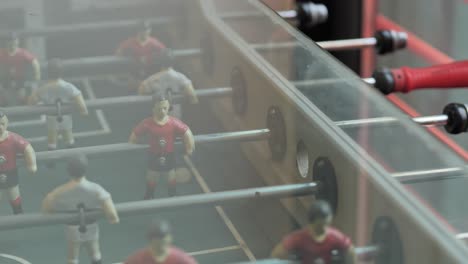 close-up of a foosball table