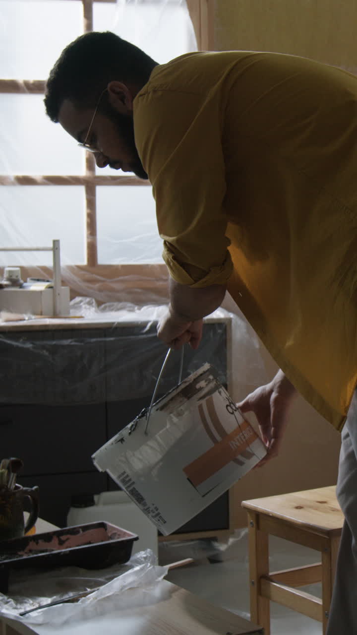 Man painting interior